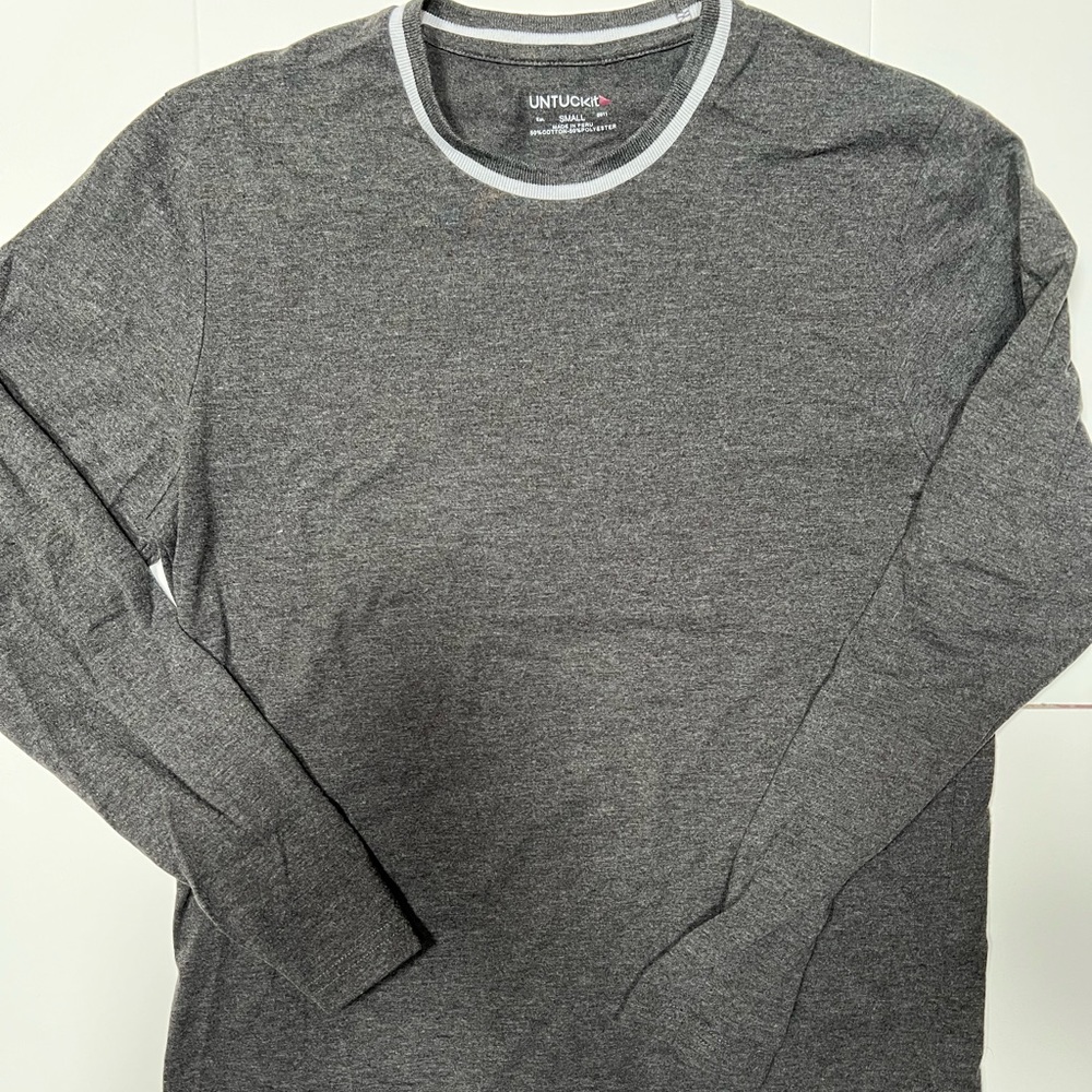 Untuckit pullover.  Long sleeve.  Medium grey with white trim.   Like new